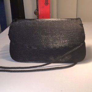 Like new La Regale hard side evening bag